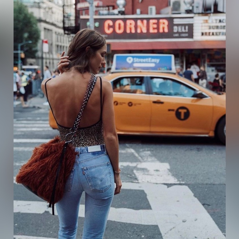 Re/DONE by Levi’s light blue up-cycled jeans size 25 with ripped knee hi waisted